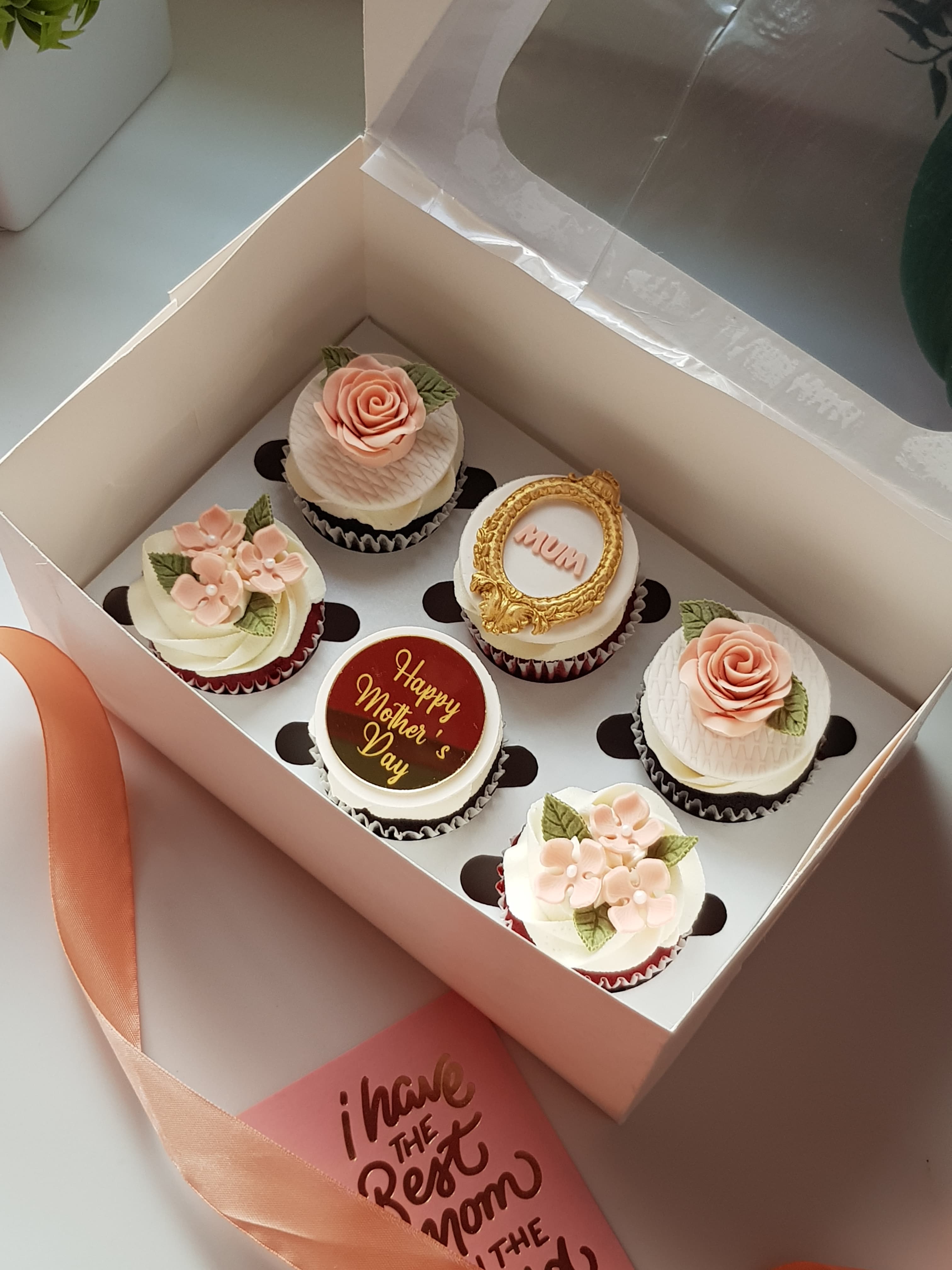 Sweet like Mom box of six cupcakes with pink buttercream flowers, gold "MUM" and "Happy Mother&