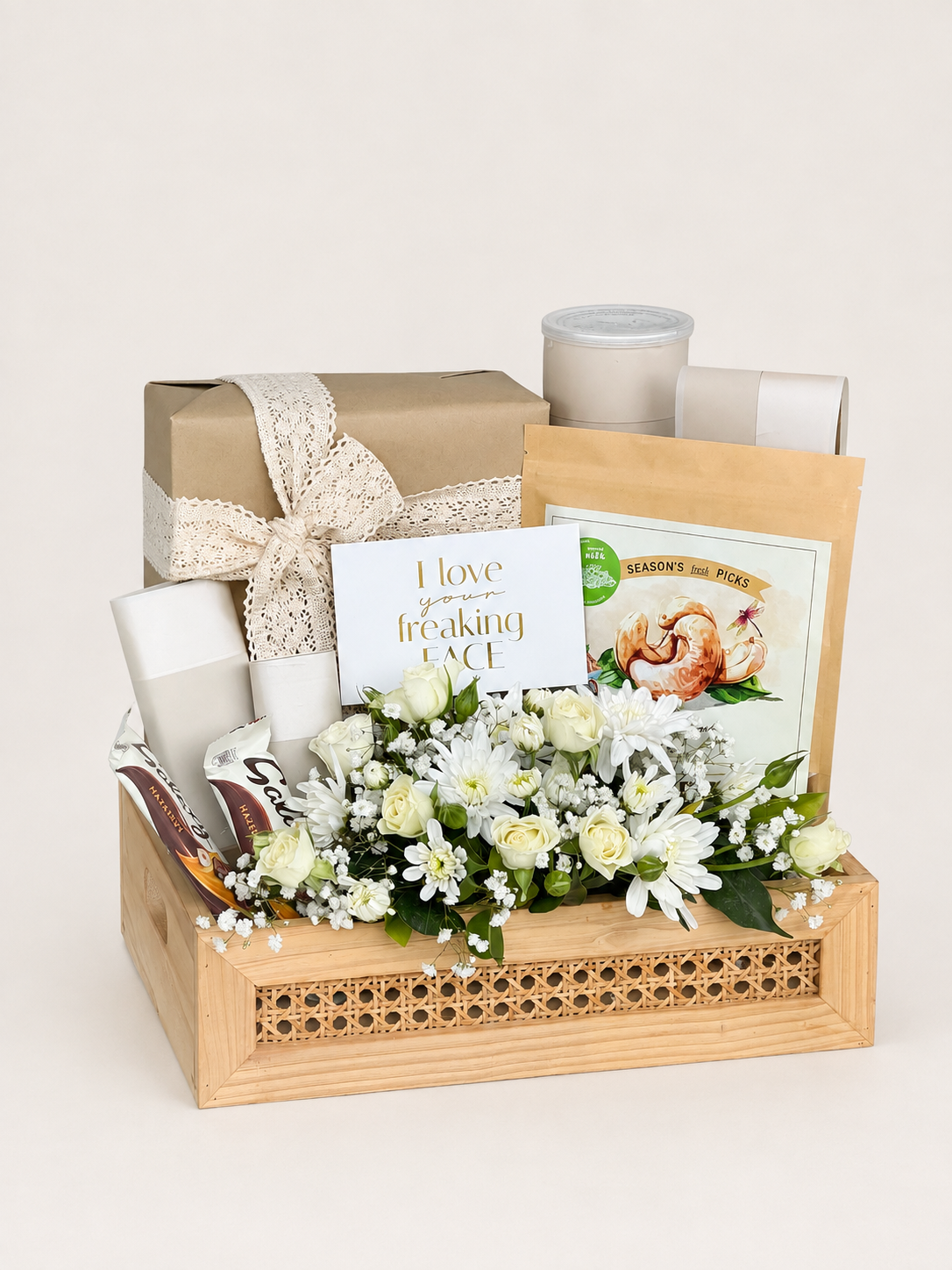 Close-up of Teddy Nest gift crate by House of Flowers featuring white spray roses, chrysanthemums, baby&