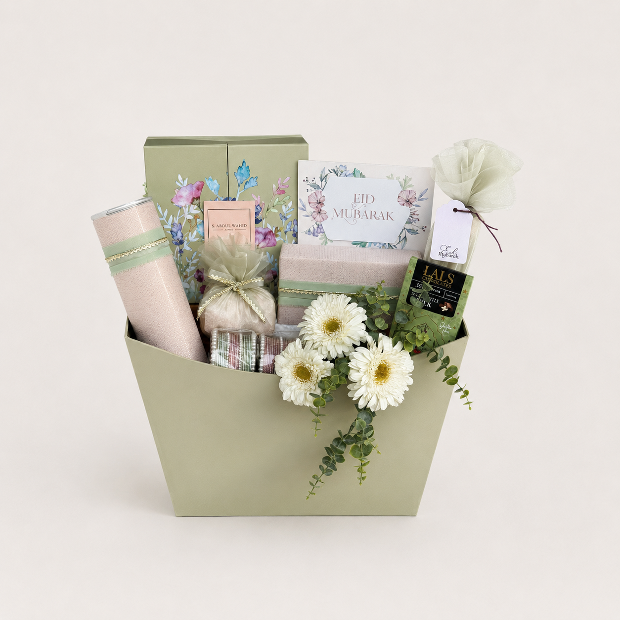 a box filled with pringles, lals and different imported chocolates and different accessories