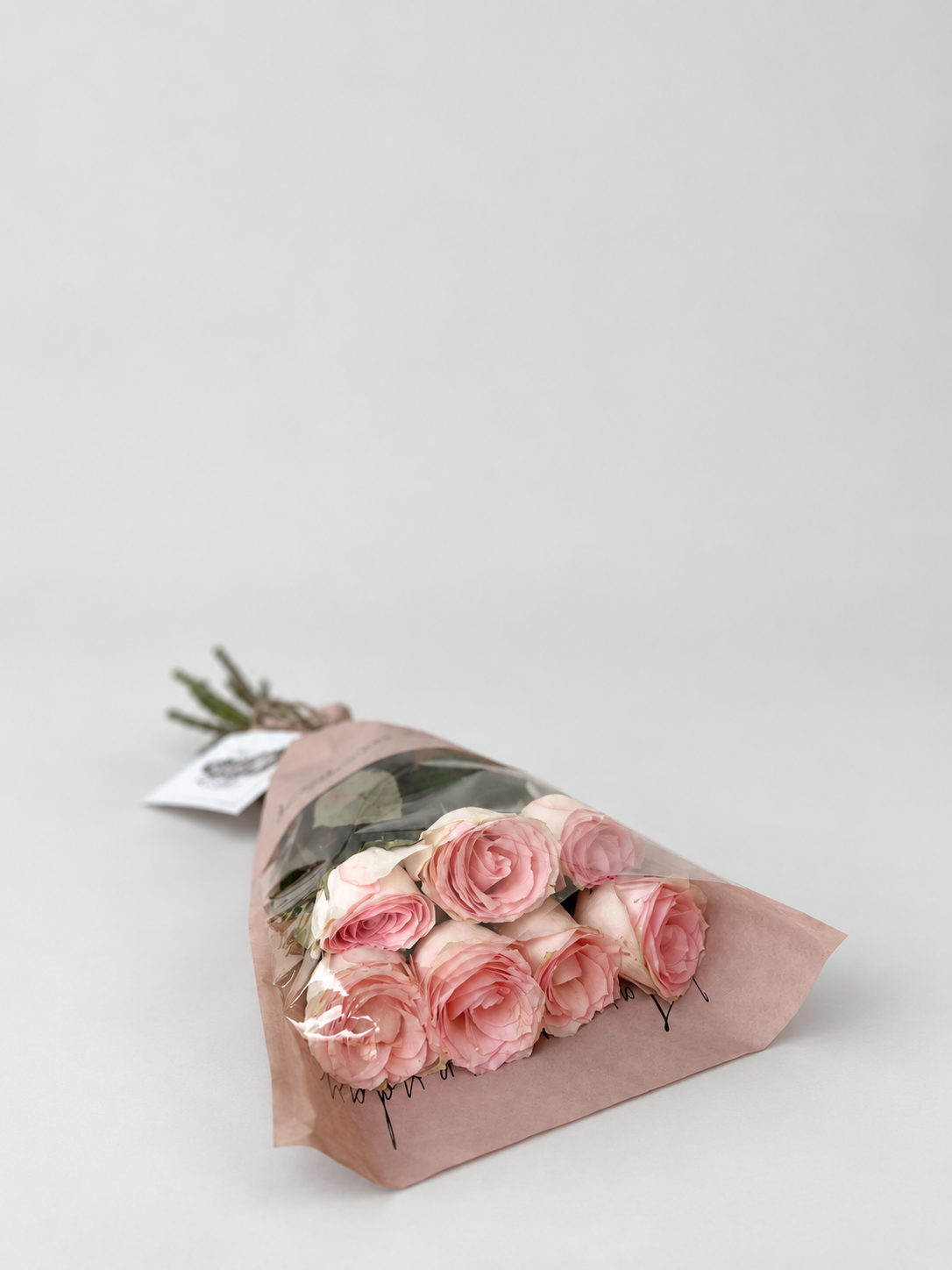 A bouquet of 7 roses and exquiite wrapping.