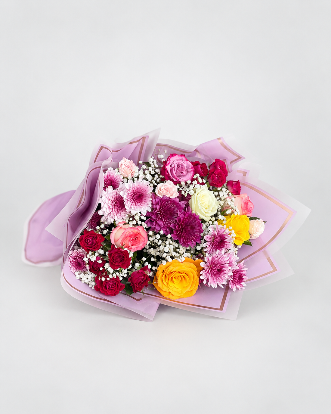 a vibrant flower bouquet with a mixture of different flowers like chrysanthemums, spray roses and roses.