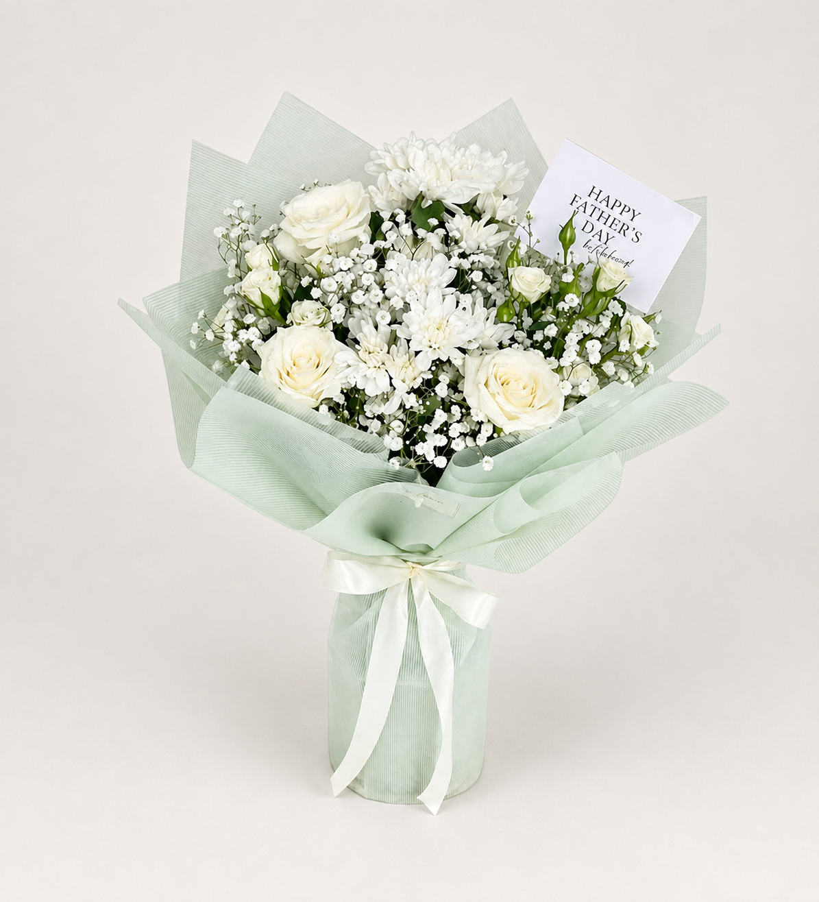 White Legacy in Bloom mixed-flower bouquet with roses, chrysanthemums, spray roses, baby’s breath, and a card