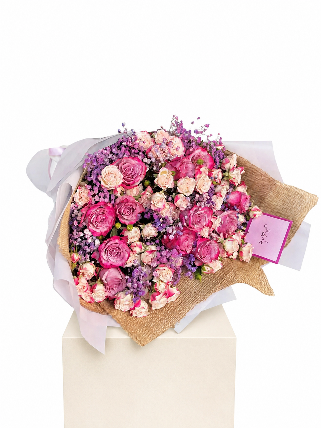 a premium bouquet of 12 roses, 12 spray roses and 2 baby&