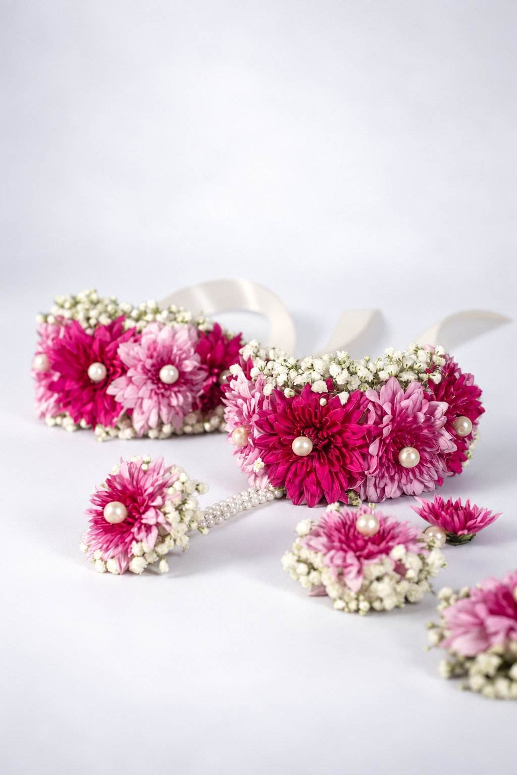Pink flower jewellery set of gajra bracelets, earrings and rings with pearls