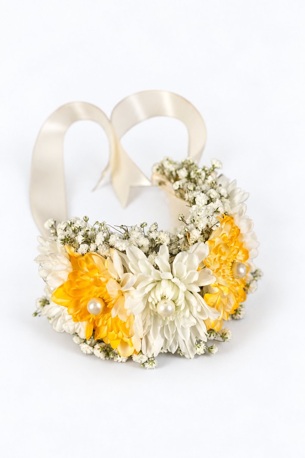Fresh flower gajra with yellow and white chrysanthemums, pearls and a cream ribbon
