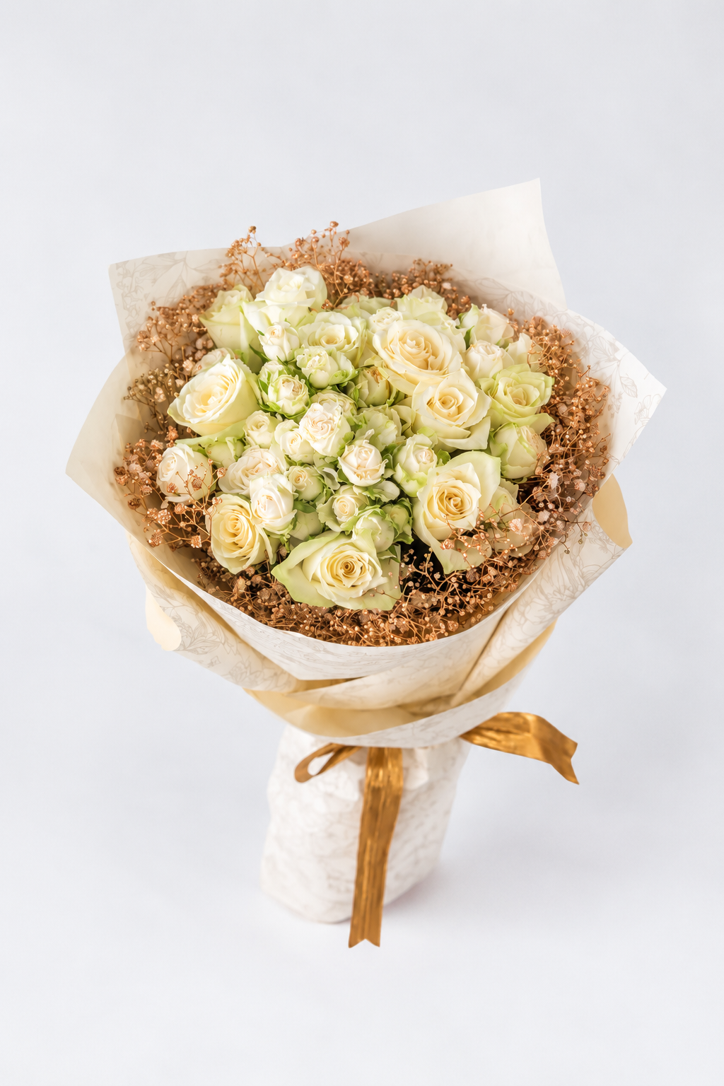 A bouquet with a mixture of roses and spray roses
