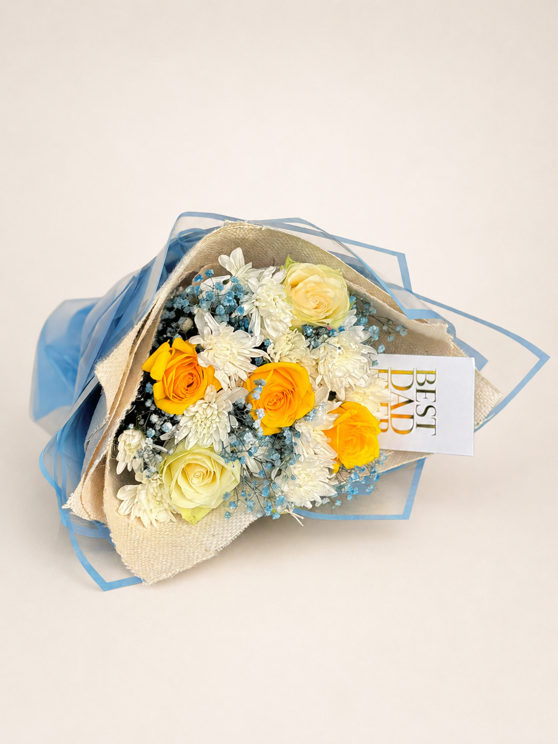 a bouquet with a mixture of flowers. roses, chrysanthmums, babys breath.