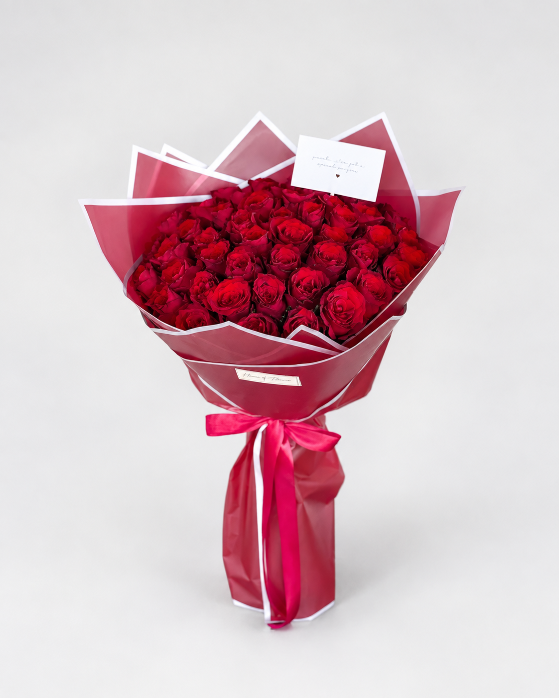 Timeless Fifty bouquet of 50 imported red roses with a greeting card from House of Flowers