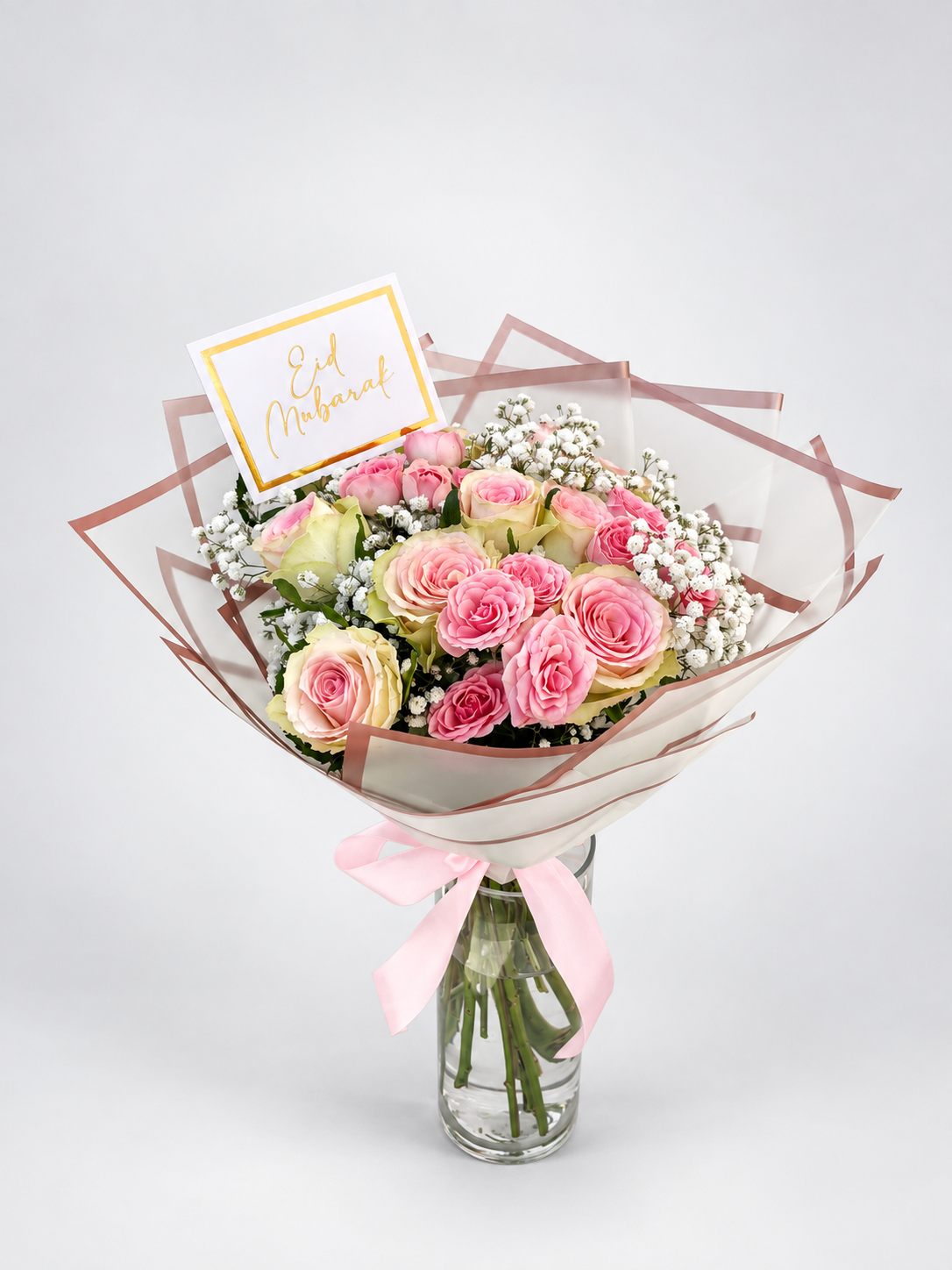 Pastel Sunset bouquet of 9 soft pink imported roses with spray roses and gypsophila
