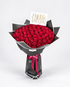 100 red rose bouquet in black wrapping with a satin ribbon and card