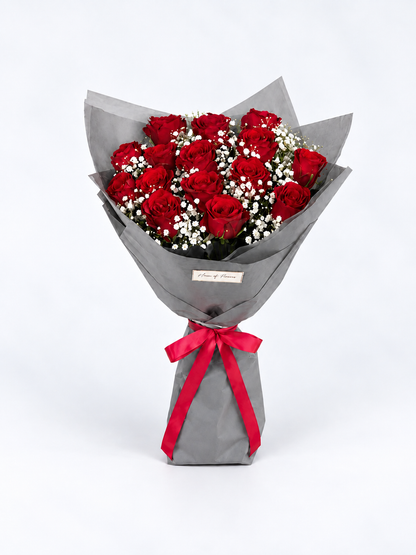 A bouquet of different imported roses and babys breath