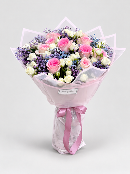 Blossoms bouquet of 10 imported roses and 8 spray roses with baby&