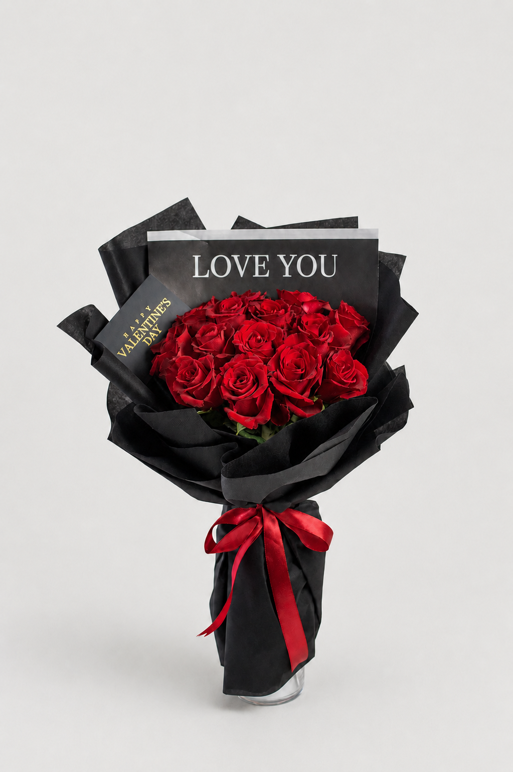 A bouquet of different imported red roses, wrapped elegantly.