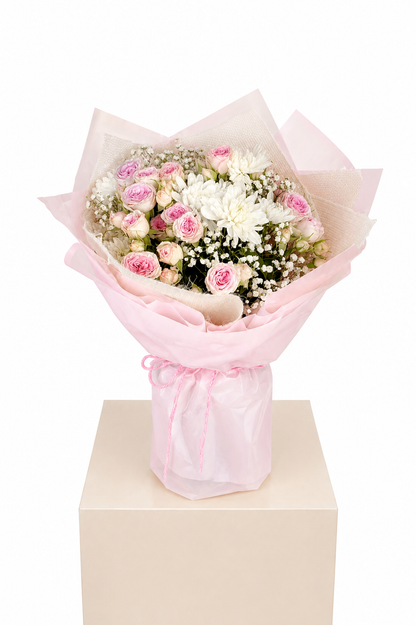 a bouquet of 5 spray roses, 2 chrysanthemums and 1 gypso.