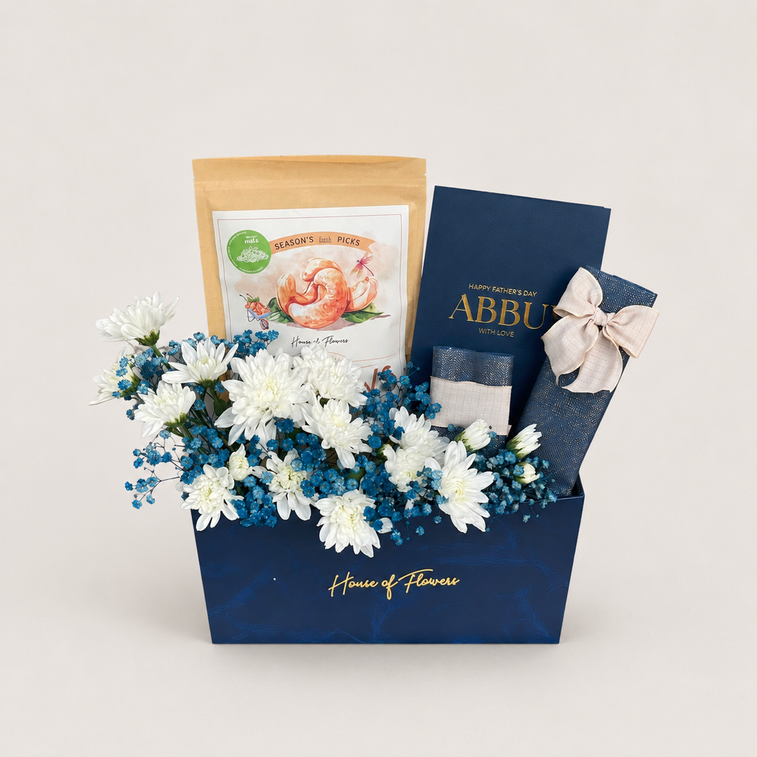 For Abbu gift box with two chrysanthemums, gypso, cashews and almonds, Hershey’s chocolate, KitKat, and a greeting card.