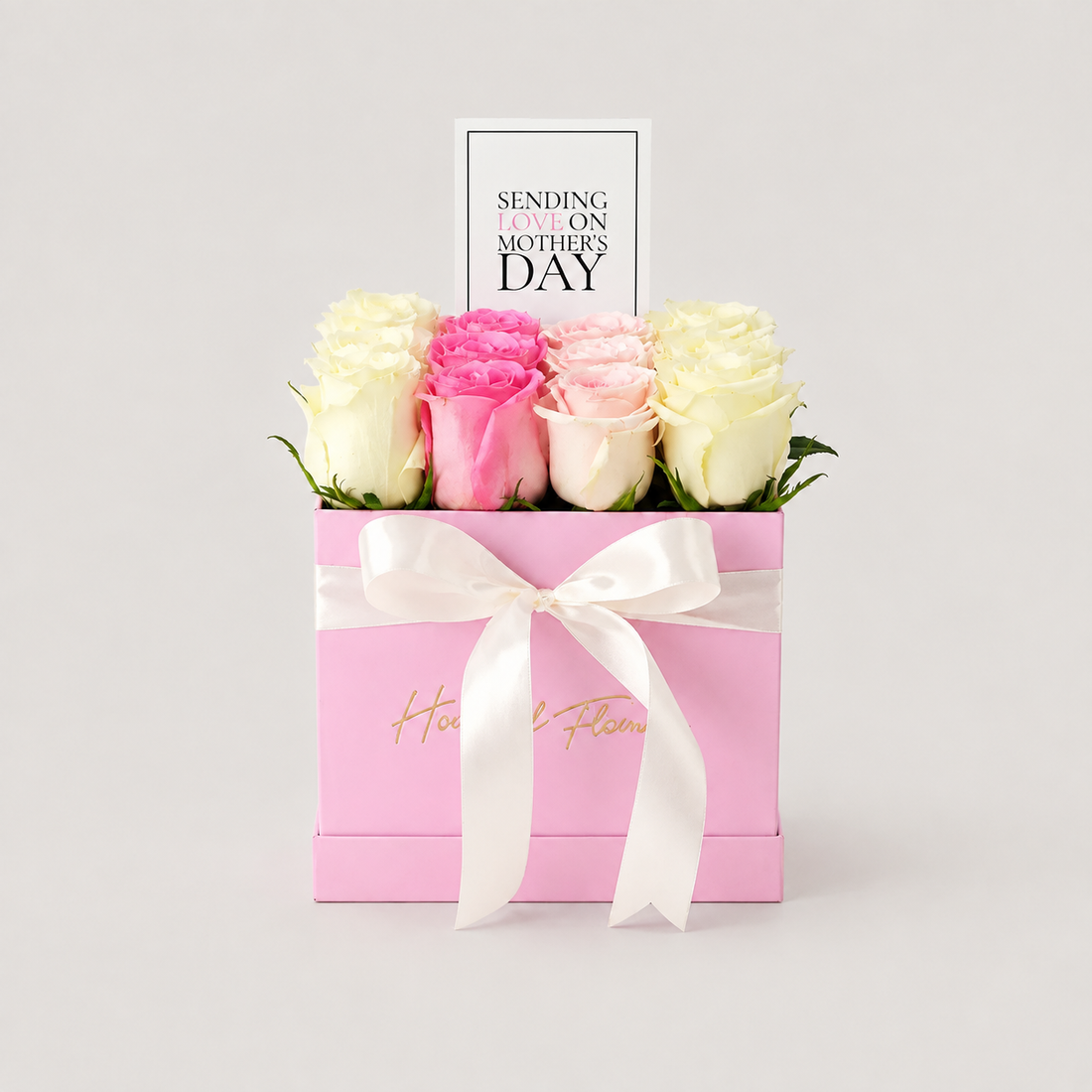 Flower basket arranged with 16 imported pink and white roses.