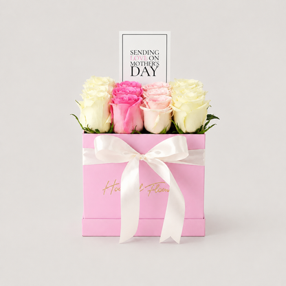 Flower basket arranged with 16 imported pink and white roses.