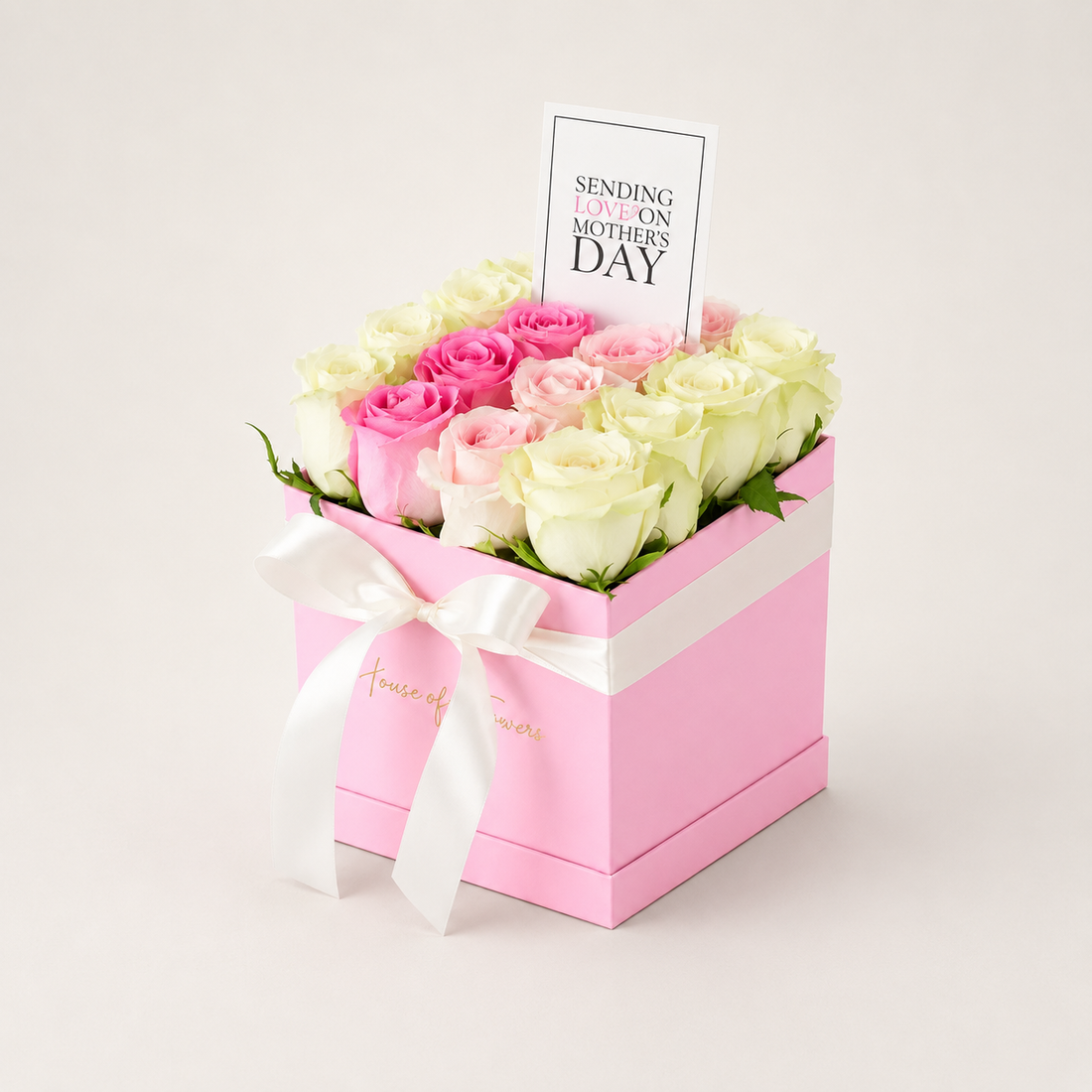 Flower basket arranged with 16 imported pink and white roses.