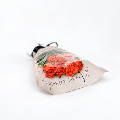 A bouquet of 7 roses and exquisite wrapping.