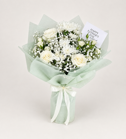 White Legacy in Bloom mixed-flower bouquet with roses, chrysanthemums, spray roses, baby’s breath, and a card