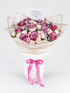 A vibrant flower bouquet featuring pink and purple roses, pink baby&