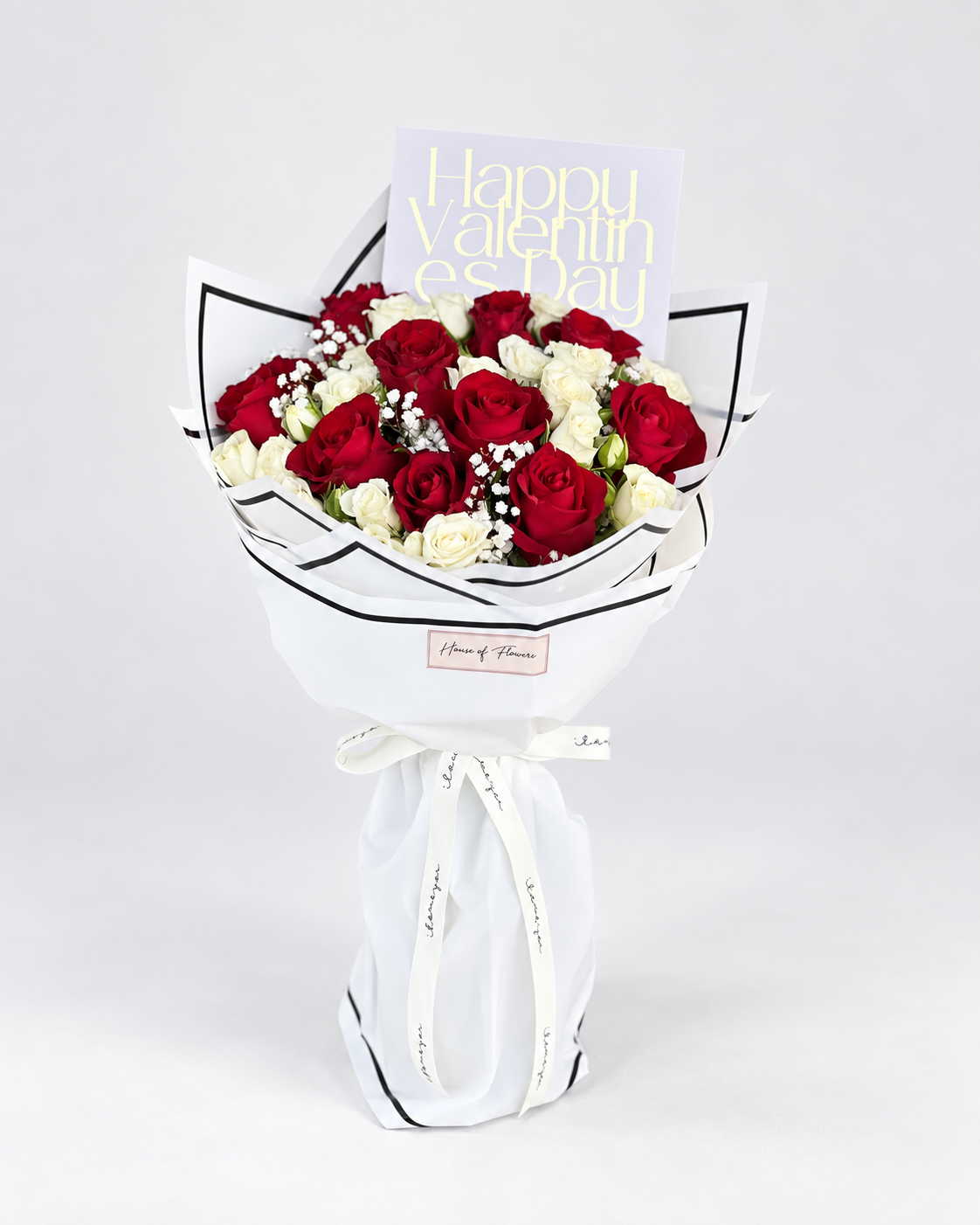 Love You bouquet of 10 red roses, 5 white spray roses and baby&