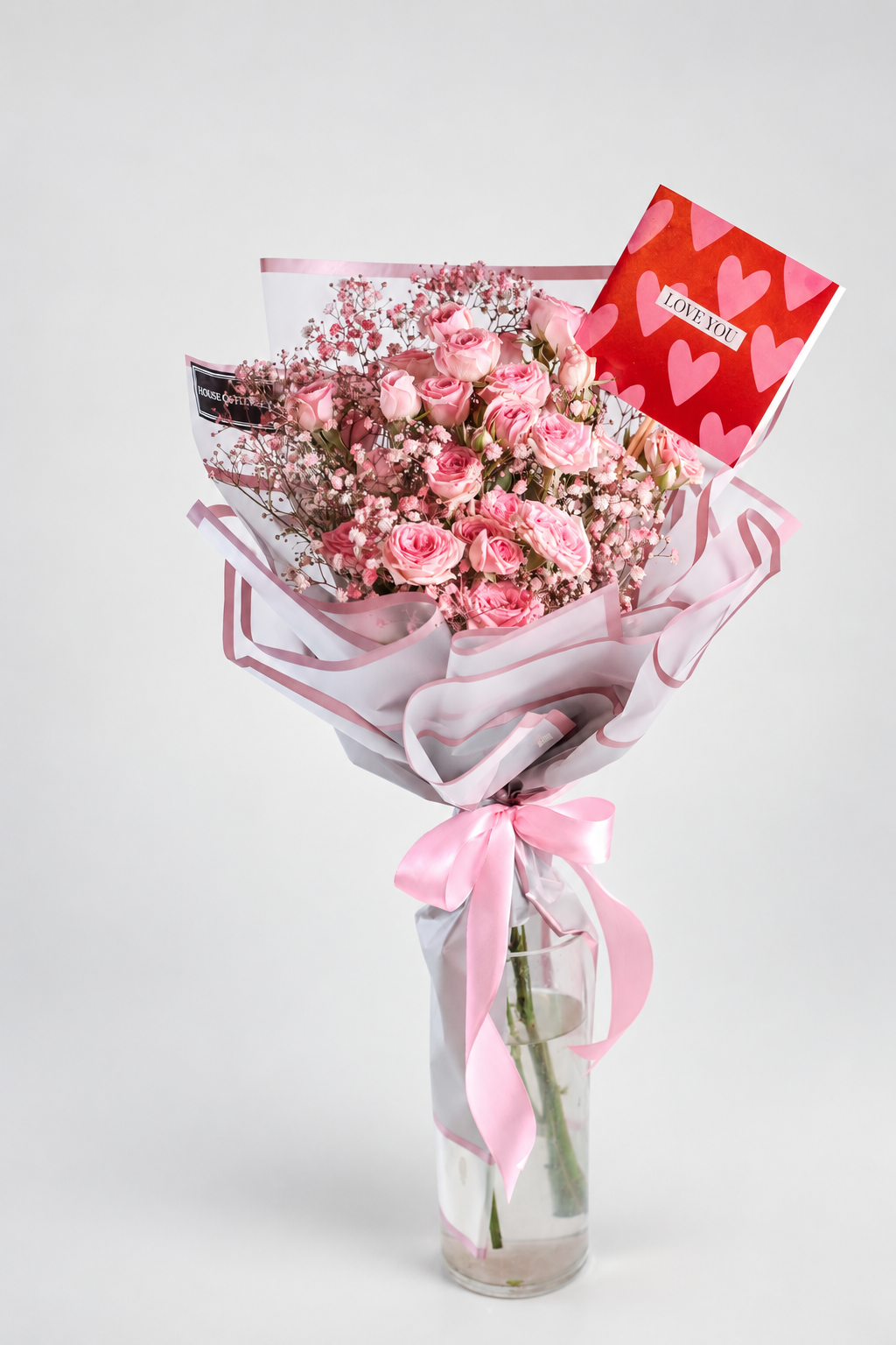the bouquet of spray roses and babys breath.