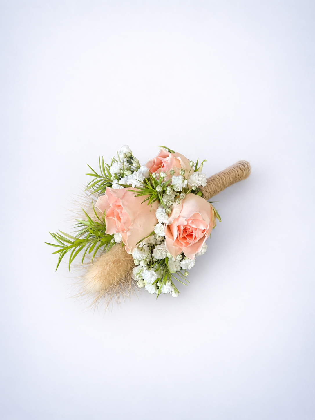 Peach spray rose boutonniere with baby&