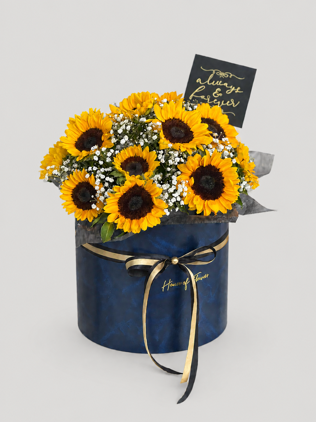a box of sunflowers and babys breath