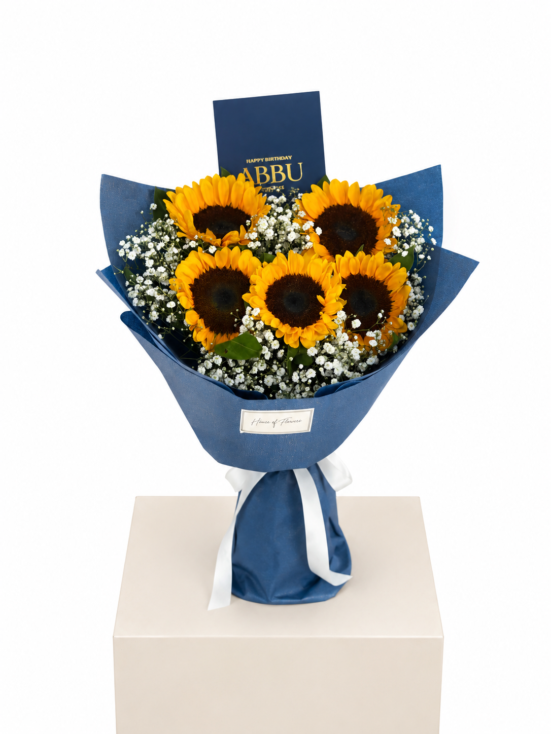 a bouquet of 5 sunflowers and gypso wrapped exquisitely in a premium fabric