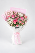 Sweet Pink Symphony bouquet with pink roses, spray roses and white chrysanthemums, wrapped with gypsophila for gifting