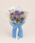The Protector blue and purple rose bouquet with baby’s breath and a greeting car