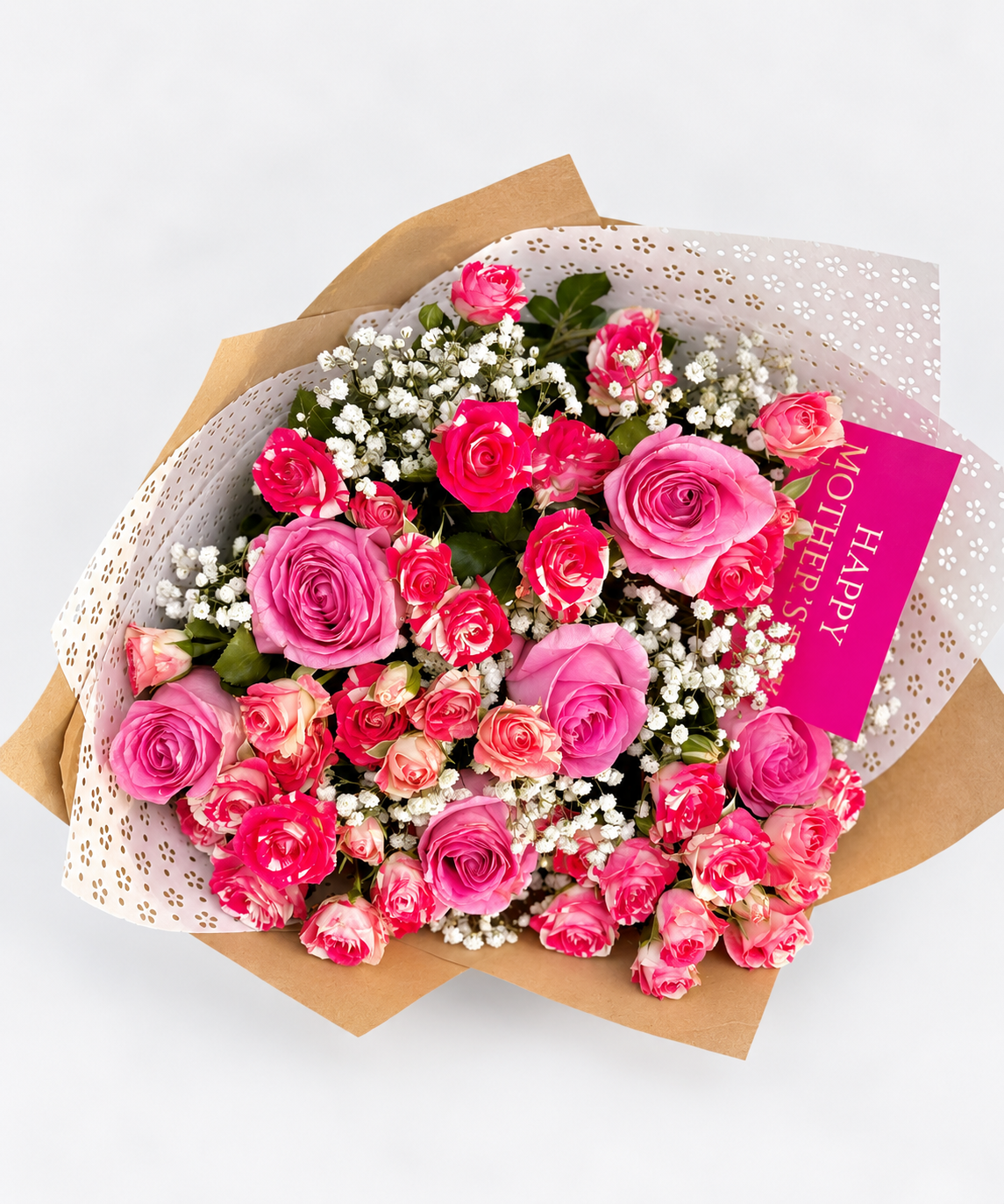 Timeless Tribute bouquet with pink and hot pink roses and gypsophila, wrapped in kraft and white paper with a pink ribbon and card