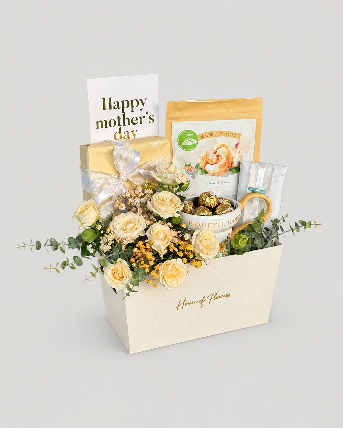 The gift basket includes mixture of flowers chocolates and dry fruits